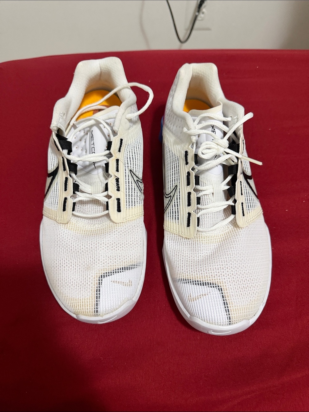 Nike Men's White Athletic Sneakers with Black and Yellow Accents